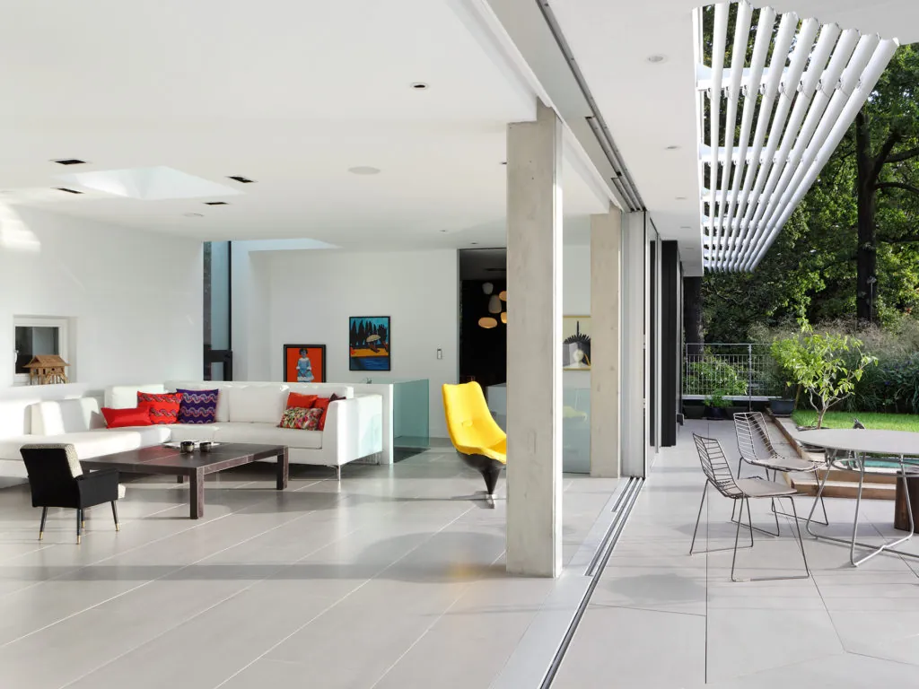 The kitchen and dining view of the pavilion building, a sustainable building design project by E2 architecture