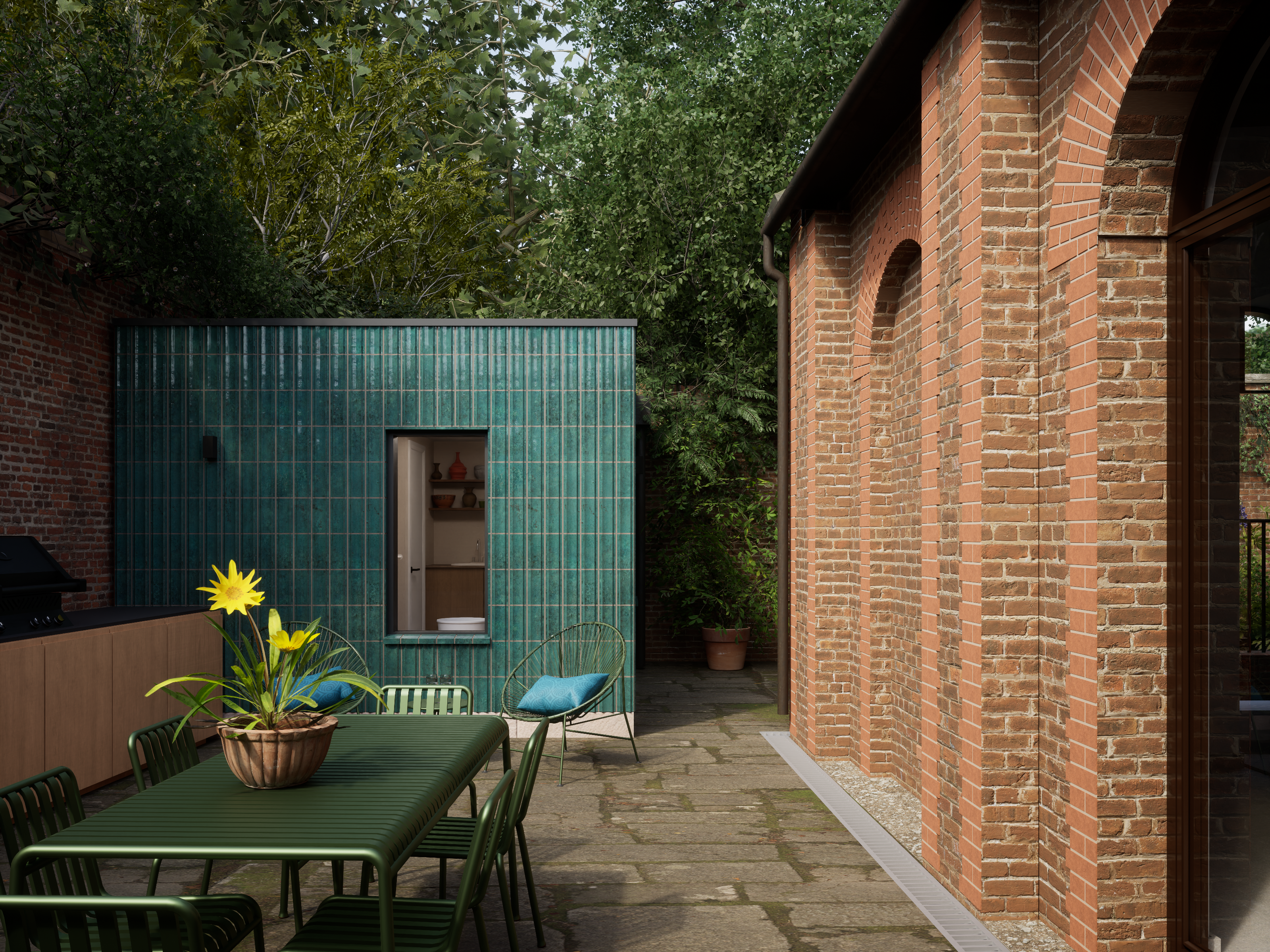 Outdoor patio with green table and potted plant.