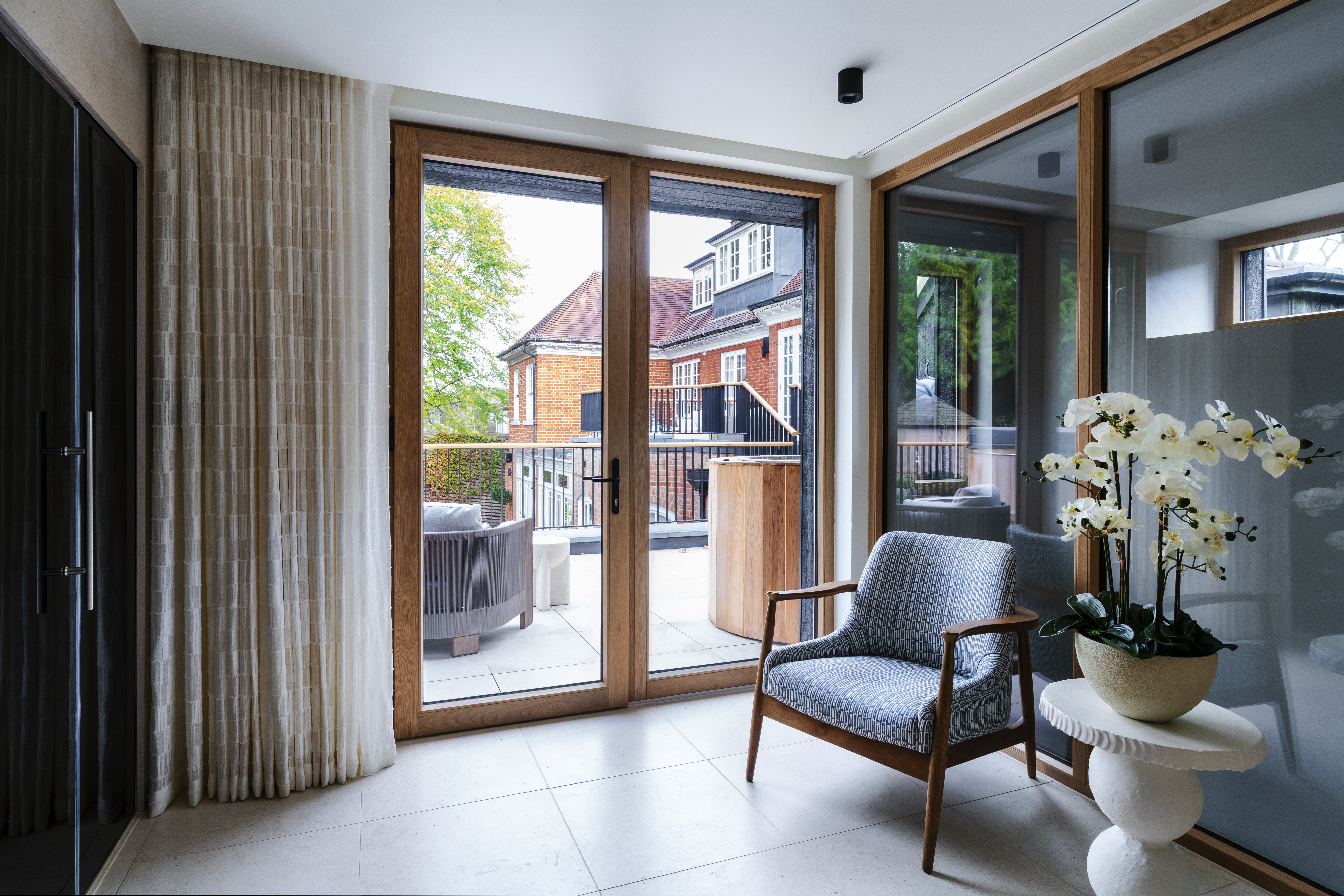 Contemporary new build in the setting of a locally listed building